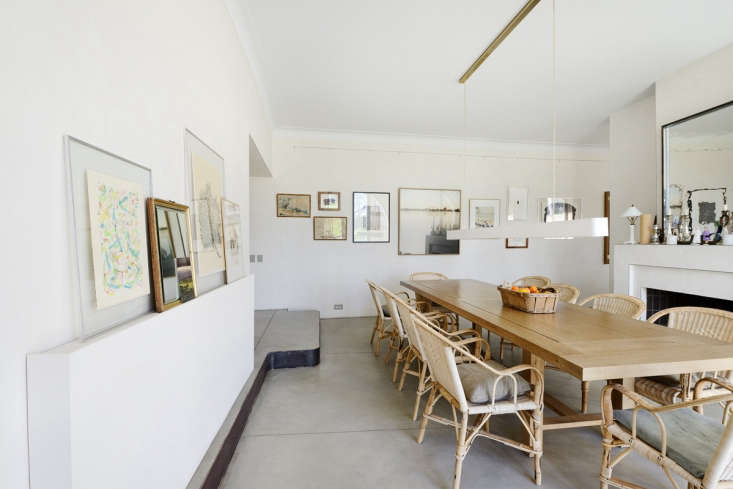 the dining room is characterized by concrete resin floors and unpainted plaster 17