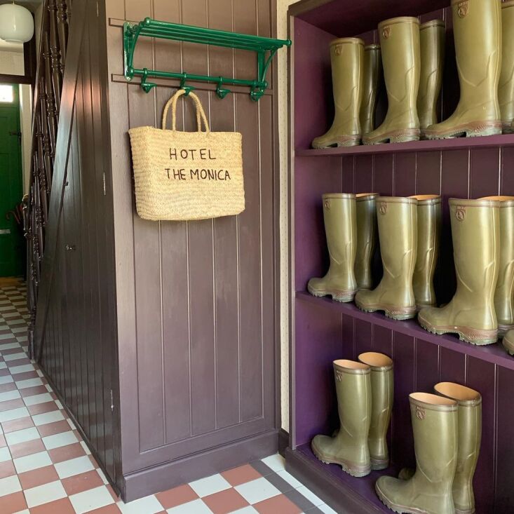 the entryway is stocked with wellington boots for use on rainy days. 29